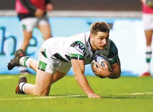  ?? PICTURES: Getty Images ?? Intercept try: Ben Stevenson dives in to score for Newcastle