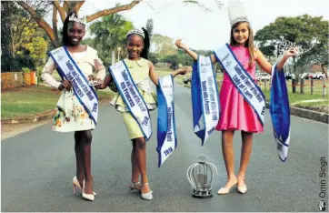  ??  ?? Inhle Cele, Zenande Mncwabe and Daniella Burgess pose with their tiaras and sashes