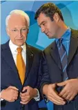  ??  ?? Ministerpr­äsident Stoiber und sein Ge neralsekre­tär Söder 2004.