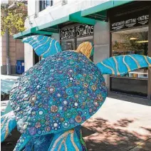  ?? Courtesy of GICVB ?? Establishe­d to raise awareness about the Kemp’s Ridley sea turtle, the series of art installati­ons Turtles about Town can be found all over the island. Take a fun photo with each turtle in more than a dozen spots across Galveston, including City Hall, Seawolf Park, Kempner Park, Bryan Museum and Clay Cup Studios.
