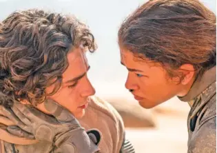  ?? PHOTOS BY WARNER BROS. PICTURES VIA AP ?? Timothee Chalamet, left, and Zendaya appear in a scene from “Dune: Part Two.”