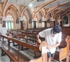  ?? ANI ?? ■
Right: A worker sanitises the St Teresa church in Kolkata.