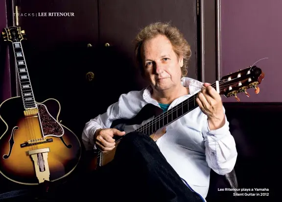  ?? ?? Lee Ritenour plays a Yamaha Silent Guitar in 2012