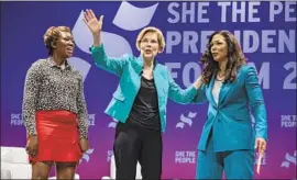  ?? Sergio Flores Getty I mages ?? BROADCASTE­R Joy Reid, from left, Sen. Elizabeth Warren and “She the People” founder Aimee Allison at a Houston forum on politics and women of color.