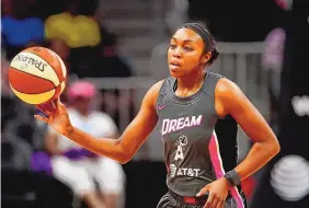  ?? JOHN BAZEMORE/ASSOCIATED PRESS ?? Renee Montgomery, shown in action with the Atlanta Dream in 2019, is making history as part of a three-member new ownership group of the team.