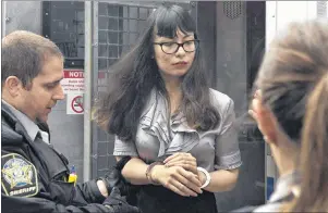  ?? THE CANADIAN PRESS/ANDREW VAUGHAN ?? Lindsay Kantha Souvannara­th arrives at provincial court for a preliminar­y hearing in Halifax in this July 8, 2015, file photo. As a high school student, the American teen from a middle-class suburb of Chicago is remembered as quiet, clean-cut and a...