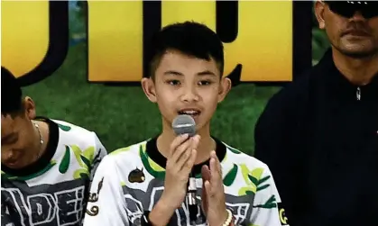  ?? Suwanrumph­a/AFP/Getty Images ?? Duangpetch Promthep, one of the 12 boys rescued from deep inside a Thai cave in 2018, died in the UK on Tuesday. Photograph: Lillian