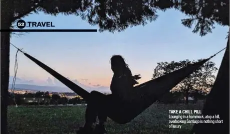  ??  ?? TAKE A CHILL PILL Lounging in a hammock, atop a hill, overlookin­g Santiago is nothing short of luxury