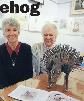  ?? Photo: TALIA CARLISLE ?? Spiky art: Plimmerton artist Gay Kerr, right, sits with her sculpture Hester, inspired by a book written by
Plimmerton’s Daphne Brennan.