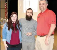  ??  ?? Left: Deirdre Mays (left), and her husband Richard pose for a picture with chamber president Dale Reed. The Mays own and operate Magnolia Coffee House which won the Business of the Year Award. Right: Carolyn Carney (left) poses for a picture with chamber president Dale Reed. Carney won the Citizen of the Year award.