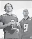  ?? Calgary Herald/files ?? Calgary Stampeders Drew Tate, left, here with running back Jon Cornish, will not be able to throw to Nik Lewis on Friday.