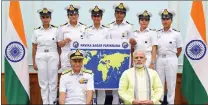  ??  ?? PROUD SAILORS: The INSV Tarini team, currently circumnavi­gating the globe. In front is Admiral Sunil Lanba (left) and Indian Prime Minister Narendra Modi.