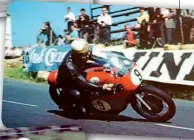  ?? DON MORLEY ?? Right: Next year, another win – Mike en route to the 1962 Senior TT on his MV.