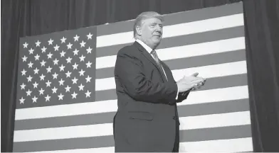  ?? BRIAN BLANCO / GETTY IMAGES ?? Republican presidenti­al candidate Donald Trump arrives to speak to supporters at a rally Friday in North Carolina.