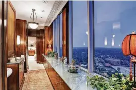  ?? Photo courtesy of John Daugherty, Realtors ?? At 121 N. Post Oak Lane #2501, this penthouse apartment in The Houstonian is designed to offer impressive views.