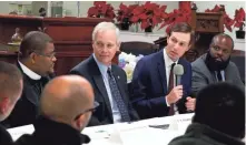  ?? RICK WOOD / MILWAUKEE JOURNAL SENTINEL ?? Jared Kushner, second right, joins U.S. Sen. Ron Johnson, Pastor Jerome Smith of Greater Praise Church of God, and Ja’Ron Smith, special assistant to the president, right.