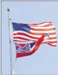  ?? OXFORD EAGLE ?? Since 1894, the Mississipp­i flag has had the Confederat­e battle emblem in the upper left corner — a blue “X” with 13 white stars, over a field of red.