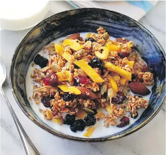  ??  ?? Rolled oats and steel-cut oats combine in this granola rich with seeds, nuts and fruit.