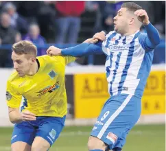  ??  ?? Derby mission: Jonny Addis (left) is eyeing victory over fierce rivals Coleraine to avoid getting drawn closer to the bottom