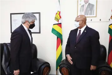  ?? Picture: Memory Mangombe ?? Speaker of the National Assembly Advocate Jacob Mudenda (right) welcomes the Islamic Republic of Iran Ambassador to Zimbabwe Mr Abbas Navazani during a courtesy call in Harare yesterday. —