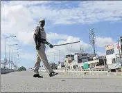  ?? HT ?? A policeman on duty during curfew in Patiala on August 28.