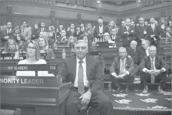  ?? JESSICA HILL/AP ?? Connecticu­t House Minority Leader Themis Klarides, R-Derby, left, and Senate Minority Leader Len Fasano, R-North Haven, center, sit with Republican­s as they listen to Gov. Ned Lamont deliver the State of the State on Feb. 5.