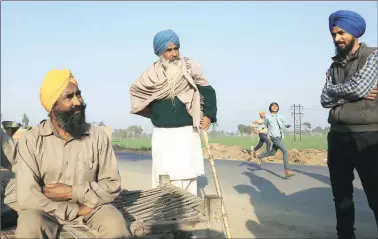  ?? Kamleshwar Singh ?? Gurcharan Singh (far left) of Patti lost his son Jasbir Singh to a drug overdose.