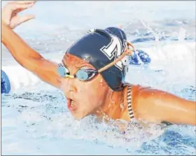  ?? RACHEL WISNIEWSKI — FOR DIGITAL FIRST MEDIA ?? Ashli Lao swims the “12 and under” 50m butterfly race for Nor-Gwyn in its meet against Harleysvil­le Thursday.