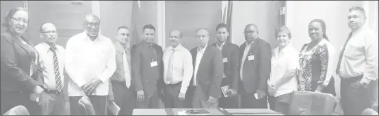  ??  ?? Central Bank Head Gobind Ganga (sixth from left) with the private sector team.