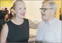  ?? MITCH MACDONALD/THE GUARDIAN ?? Federal Environmen­t Minister Catherine McKenna chats with Cardigan MP Lawrence MacAulay during a reception for the Commission for Environmen­t Cooperatio­n at Greenwich Interpreta­tion Centre Tuesday night. McKenna will lead a public session during the...