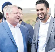  ??  ?? Ontario PC Leader Doug Ford, left, and former candidate Simmer Sandhu — in a photo from Twitter — at the opening of Sandhu’s campaign office in Brampton on April 21.