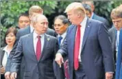  ?? REUTERS FILE ?? US President Donald Trump and Russia's President Vladimir Putin talk during the APEC Summit in Vietnam last November