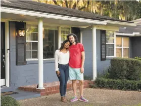  ?? Charlotte Kesl / New York Times ?? Abena and Alex Horton got a second appraisal for 40% more after she removed all signs of Blackness from their Florida home.
