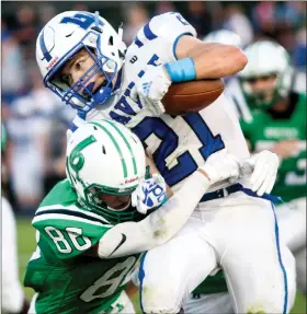  ?? PILOT PHOTO/MISSI COFFEL ?? Laville’s Kolby Watts gets caught up by Bremen’s Zack Miller.