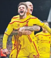  ??  ?? Liverpool’s Adam Lallana (foreground) scored the winner in the 58th minute. AFP PHOTO