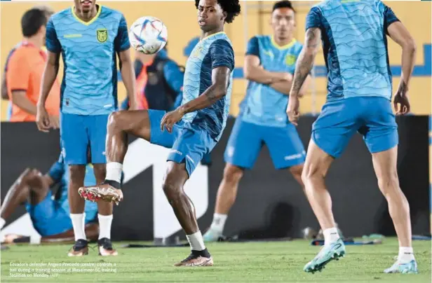  ?? ?? Ecuador’s defender Angelo Preciado (centre) controls a ball during a training session at Mesaimeer SC training facilities on Monday.