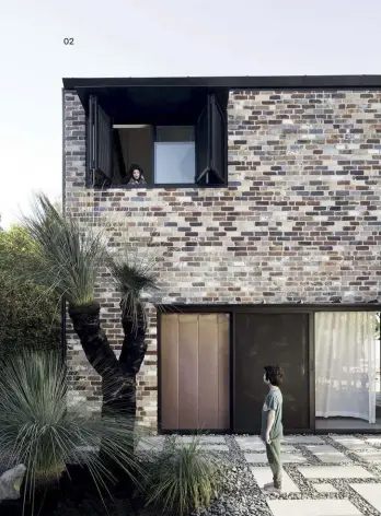  ??  ?? 02 01 For Belqis Youssofzay and David Hart, responding to environmen­tal issues through design is key.
02 At Courtyard House, recycled brick extends and expands an existing cottage. Photograph: Benjamin Hosking.