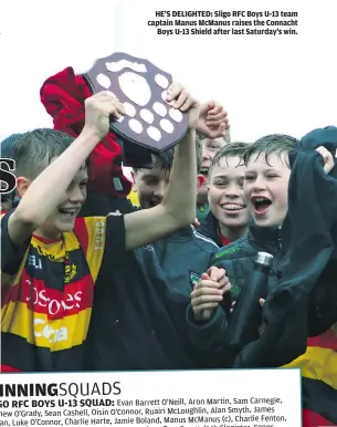  ?? ?? HE’S DELIGHTED: Sligo RFC Boys U-13 team captain Manus McManus raises the Connacht Boys U-13 Shield after last Saturday’s win.