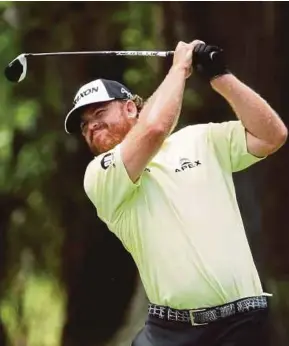  ?? AFP PIC ?? Joint leader J.B. Holmes was among the eight players who hit five or fewer fairways in the third round on Saturday.