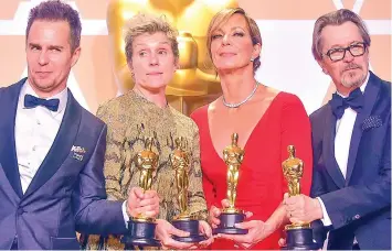  ??  ?? Sam Rockwell (Best Supporting Actor for “Three Billboards Outside Ebbing, Missouri”), Frances McDormand (Best Actress for “Three Billboards Outside Ebbing, Missouri”), Allison Janney (Best Supporting Actress for “I, Tonya”) and Gary Oldman (Best Actor...