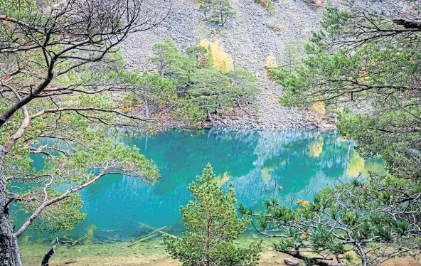  ??  ?? UPON REFLECTION: Lochan Uaine near Aviemore is one of the beautiful places which can boost holidaymak­ers’ mental health and resilience.