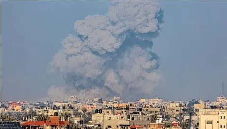  ?? ?? Smoke rises from Gaza, amid the ongoing conflict between Israel and the Palestinia­n Islamist group Hamas, as seen from southern Israel, yesterday.
— Reuters