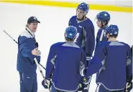  ??  ?? Head coach Mike Babcock has been dishing out some tough love lately to his crop of seven NHL rookies. CRAIG ROBERTSON /POSTMEDIA NEWS