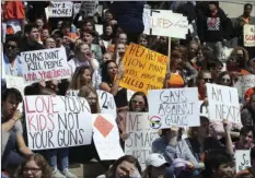  ?? AP PHOTO/JIM MONE ?? Hundreds of students gathered Friday at the State Capitol in St. Paul, Minn., to protest gun violence, part of a national high school walkout on the 19th anniversar­y of the Columbine shootings.