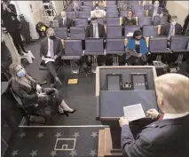  ?? The Associated Press ?? U.S. President Donald Trump arrives to speak with reporters about the coronaviru­s in the James Brady Press Briefing Room of the White House, Friday