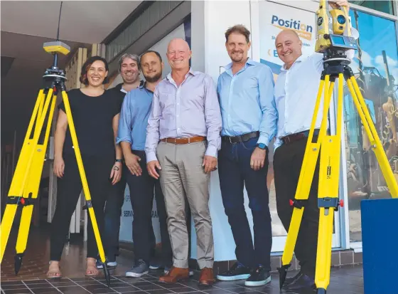  ?? ?? At Position Partners’ new Townsville office are sales rep Arlie Curtis, field technician Peter Morato, sales rep James Beattie, Martin Nix, Topcon's Richard Jackson and Harry Katsanevas.