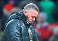  ??  ?? Wayne Rooney’s days with Manchester United look numbered, with the England striker more of a bit-part player at Old Trafford these days. A number of Chinese clubs are hoping to capitalize on the situation and tempt the 31-year-old to the Super League. FILE