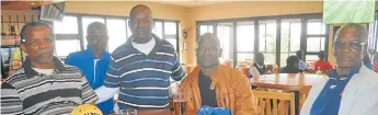  ??  ?? GOLFING PALS: Golfers enjoy a chat over drinks after the Nemato Golf Club tournament on Sunday. From left, Fuzile Mpundwini, Styles Nakani, Michael Gidana, Beny Booi and Lee Xali