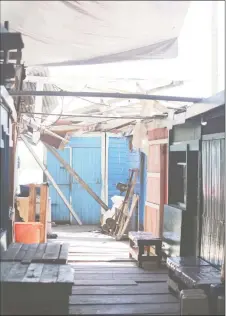  ??  ?? One of the Stabroek Market stalls operating in close proximity to the section of the roof that collapsed recently. (Photo by Terrence Thompson)