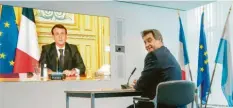  ?? Foto: Peter Kneffel, dpa ?? Präsident trifft Ministerpr­äsidenten: Emmanuel Macron und Markus Söder während ihrer Videokonfe­renz.
